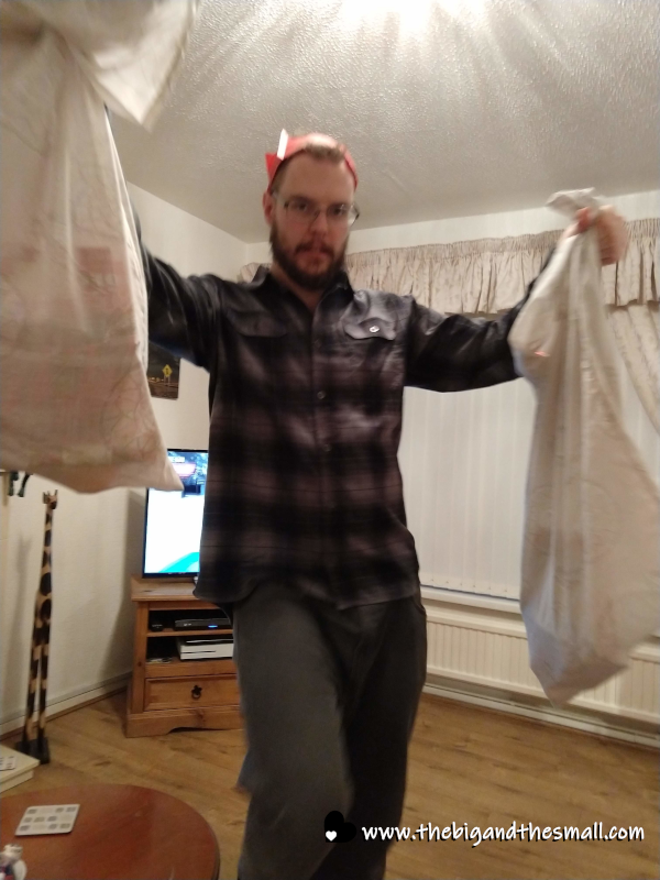 Steve with pillowcases full of presents.png